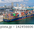 Miami, Florida - February 12, 2025: Freight container. Aerial Miami port with cargo container. Export and import. Port of Miami. Cargo ship loaded with container in Miami, aerial. Cargo port 142456606