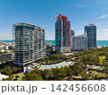 Miami Beach on blue sky. Skyline aerial view. Miami city. Tropical Miami scene. Miami district sky view. 142456608