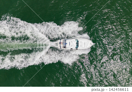 Yacht boat tour. Luxury boat yachting. Motorboat sailing at sea. Luxury private yacht in sea. Motor yacht luxury vessel. Boat motor aerial. Vacation on summer. Aerial view motorboat. Yacht holiday Yacht boat tour. Luxury boat yachting. Motorboat sailing at sea. Luxury private yacht in sea. Motor yacht luxury vessel. Boat motor aerial. Vacation on summer. Aerial view motorboat. Yacht holiday 142456611