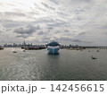 Aerial view cruise ship on summer vacation tour. Cruise ship vacation and travel by sea. Aerial view luxury liner. Ship leaving Miami beach port. Cruise ship vacation. Sail the sea 142456615
