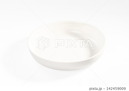 White ceramic bowl on clean white background with soft shadow and glossy finish 142459009