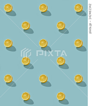 Fresh Half Lemons Pattern on Sunny Blue Background 142461342