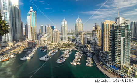 Aerial view timelapse of Dubai Marina at day time in Dubai, UAE Aerial view timelapse of Dubai Marina at day time in Dubai, UAE 142461597
