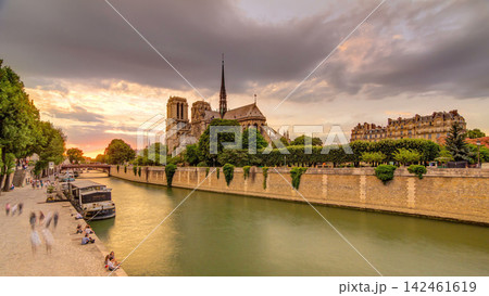 Sunset view of Cathedral Notre Dame de Paris timelapse in Paris, France. Sunset view of Cathedral Notre Dame de Paris timelapse in Paris, France. 142461619