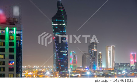 Skyline with Skyscrapers day to night timelapse in Kuwait City downtown illuminated at dusk. Kuwait City, Middle East Skyline with Skyscrapers day to night timelapse in Kuwait City downtown illuminated at dusk. Kuwait City, Middle East 142461833