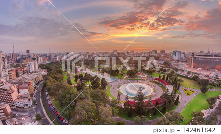 Aerial sunset view to Park of the Reserve with magic water circuit biggest fountain complex timelapse Aerial sunset view to Park of the Reserve with magic water circuit biggest fountain complex timelapse 142461842