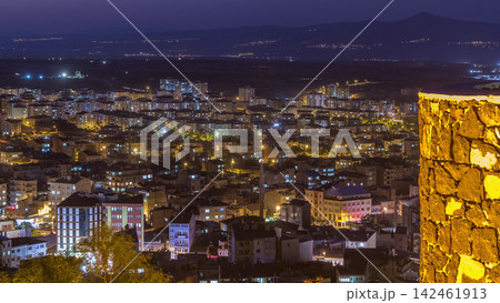 Aerial view from old castle in historical city town of Nevsehir day to night timelapse Aerial view from old castle in historical city town of Nevsehir day to night timelapse 142461913