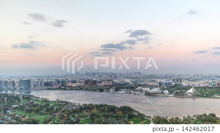 View of new modern city with green trees in luxury Dubai city, United Arab Emirates Timelapse Aerial View of new modern city with green trees in luxury Dubai city, United Arab Emirates Timelapse Aerial 142462017