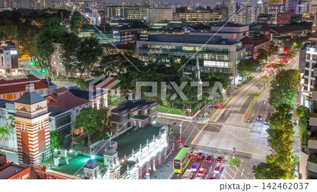 Street traffic near the fire station of Singapore day to night aerial timelapse. 142462037