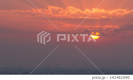 Sunset in Ajman aerial view from rooftop timelapse. United Arab Emirates. 142462090