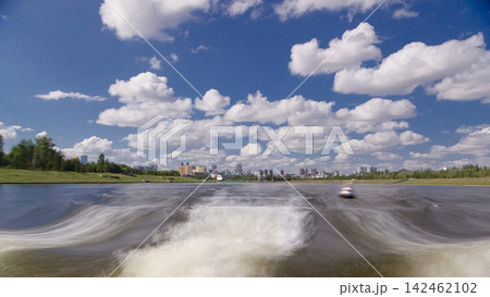 Astana, Kazakhstan. View from Pleasure boat on the river Ishim timelapse hyperlapse drivelapse in Astana. Astana, Kazakhstan. View from Pleasure boat on the river Ishim timelapse hyperlapse drivelapse in Astana. 142462102