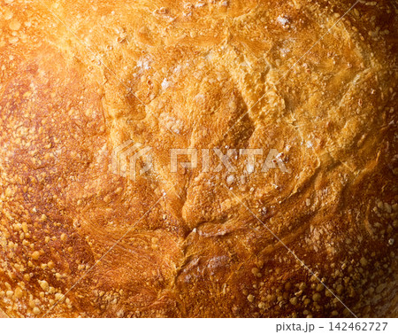 close up of wheat rustic bread with sourdough , food textured. Background of wheat bread with sourdough. wheat rustic bread with sourdough close up. close up of wheat rustic bread with sourdough , food textured. Background of wheat bread with sourdough. wheat rustic bread with sourdough close up. 142462727