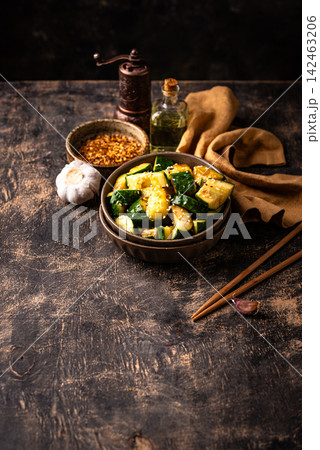 Asian style marinated cucumber with chili 142463206