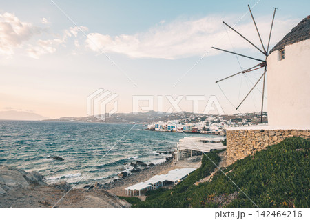 Scenic Sea With A Windmill In Front And A Greek Island Landscape Scenic Sea With A Windmill In Front And A Greek Island Landscape 142464216