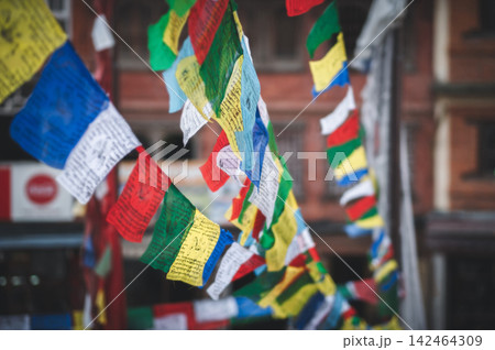 Colorful Prayer Flags Fluttering in Kathmandu Colorful Prayer Flags Fluttering in Kathmandu 142464309