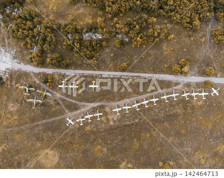 Aerial View of Abandoned Aircrafts on Grass Field Aerial View of Abandoned Aircrafts on Grass Field 142464713