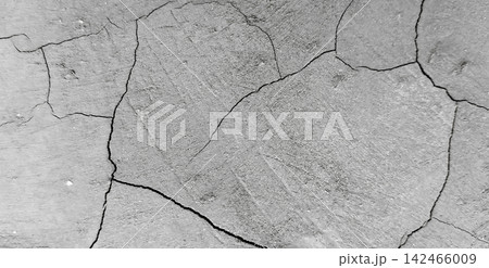 Cracked gray concrete surface texture Cracked gray concrete surface texture 142466009