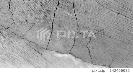 Cracked gray concrete surface texture Cracked gray concrete surface texture 142466086