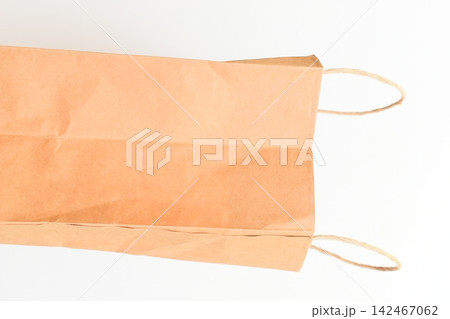 brown paper bag isolated on white background, recycle material 142467062