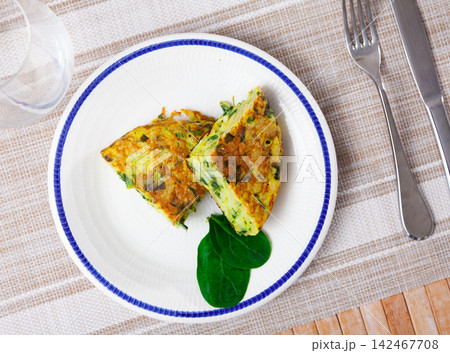 Spinach omelette served for breakfast on platter Spinach omelette served for breakfast on platter 142467708