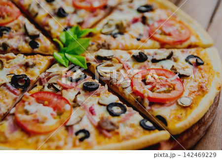 Large pizza Large pizza 142469229