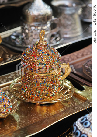 Decorative colorful tea container on display Decorative colorful tea container on display 142469646