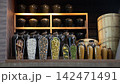 Ceramic fermentation jars with cutaway cross-sections of preserved food 142471491