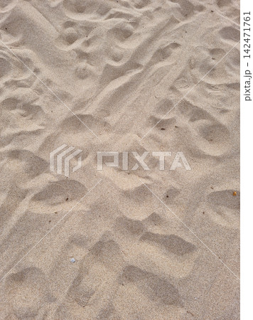 A close-up of the sand on the beach. A close-up of the sand on the beach. 142471761