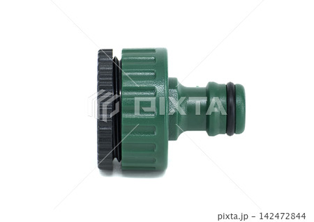 Green plastic garden hose connector with black threaded coupling on white background Green plastic garden hose connector with black threaded coupling on white background 142472844