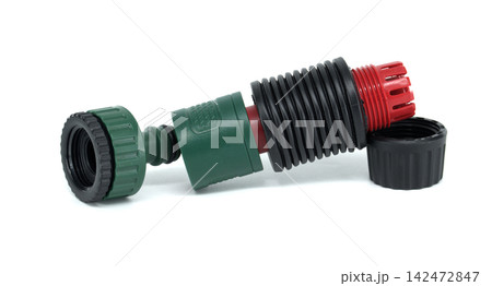 Gardening hose connector with flexible ribbed tube and threaded cap on white background Gardening hose connector with flexible ribbed tube and threaded cap on white background 142472847