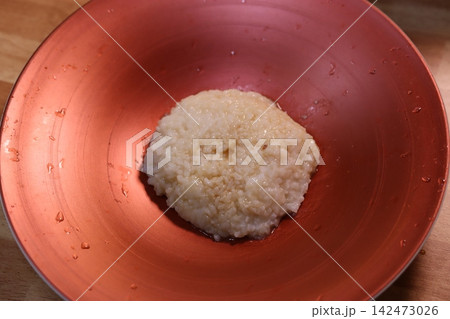 Cooked Rice in Copper Bowl Cooked Rice in Copper Bowl 142473026