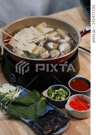 Korean Hot Pot with Side Dishes and Ingredients Korean Hot Pot with Side Dishes and Ingredients 142473192