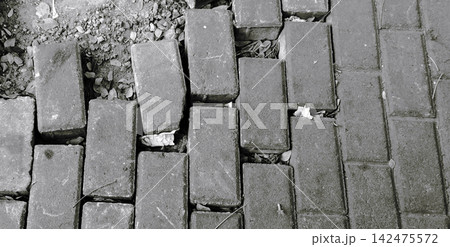 Damaged Paving Block Walkway Transition Damaged Paving Block Walkway Transition 142475572