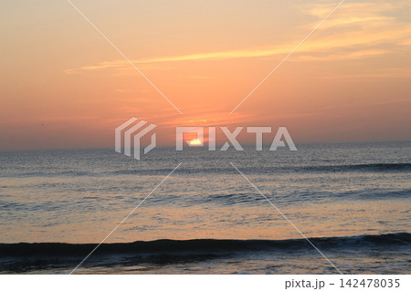 Sunrise Over the Ocean in Corolla North Carolina Filling the sky with Color Sunrise Over the Ocean in Corolla North Carolina Filling the sky with Color 142478035
