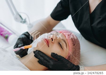 Beauty treatment and face mask at aesthetic clinic Beauty treatment and face mask at aesthetic clinic 142478265