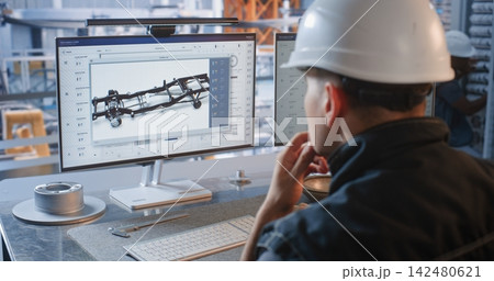 Industrial Specialist Monitoring Conveyor Robots from Factory Glass Office 142480621