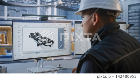 Male Caucasian Operator Monitoring Automated Assembly Line Graphics in Futuristic Plant Male Caucasian Operator Monitoring Automated Assembly Line Graphics in Futuristic Plant 142480953