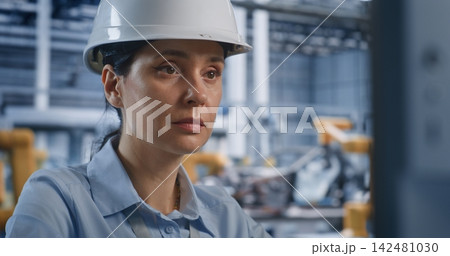 Female Specialist Managing Modern Industrial Software at Workstation Female Specialist Managing Modern Industrial Software at Workstation 142481030