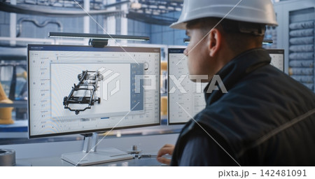 Male Caucasian Operator Monitoring Automated Assembly Line Graphics in Futuristic Plant 142481091