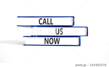 Call us now words symbol. Concept words Call us now on beautiful books. Beautiful white background. Business support motivational and call us now concept. Copy space. Call us now words symbol. Concept words Call us now on beautiful books. Beautiful white background. Business support motivational and call us now concept. Copy space. 142483578