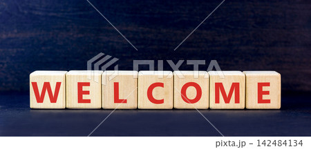 Welcome word symbol. Concept word Welcome on beautiful wooden blocks. Beautiful black table black background. Business welcome word concept. Copy space. Welcome word symbol. Concept word Welcome on beautiful wooden blocks. Beautiful black table black background. Business welcome word concept. Copy space. 142484134