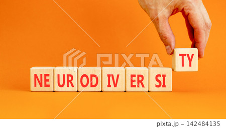 Neurodiversity word symbol. Concept word Neurodiversity on beautiful wooden blocks. Beautiful orange table orange background. Business science biological medical neurodiversity word concept Copy space 142484135