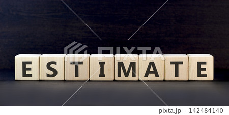 Estimate word symbol. Concept word Estimate on beautiful wooden blocks. Beautiful black background. Business support help estimate word concept. Copy space. Estimate word symbol. Concept word Estimate on beautiful wooden blocks. Beautiful black background. Business support help estimate word concept. Copy space. 142484140
