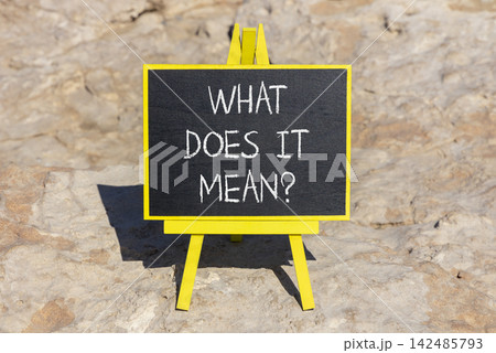 What does it mean words symbol. Concept words What does it mean on beautiful black blackboard. Beautiful stone background. Business What does it mean motivational support concept. Copy space. 142485793