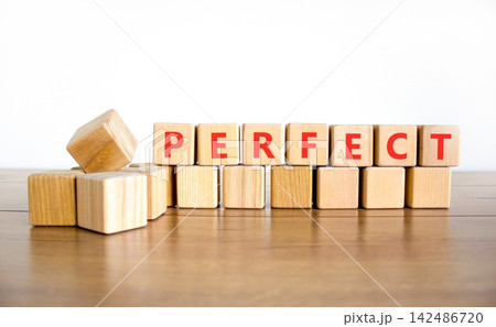 Perfect word symbol. Concept word Perfect on beautiful wooden blocks. Beautiful wooden table white background. Business perfect word concept. Copy space. Perfect word symbol. Concept word Perfect on beautiful wooden blocks. Beautiful wooden table white background. Business perfect word concept. Copy space. 142486720