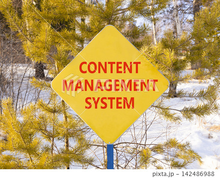 Content management system symbol. Concept words Content management system on beautiful yellow road sign. Beautiful winter forest background. Business content management system concept. Copy space. Content management system symbol. Concept words Content management system on beautiful yellow road sign. Beautiful winter forest background. Business content management system concept. Copy space. 142486988