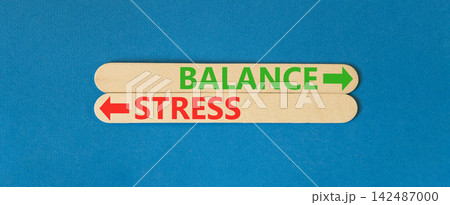 Balance instead stress words symbol. Concept words Balance Stress on beautiful wooden sticks. Beautiful blue background. Business medical psychology balance stress concept. Copy space. Balance instead stress words symbol. Concept words Balance Stress on beautiful wooden sticks. Beautiful blue background. Business medical psychology balance stress concept. Copy space. 142487000
