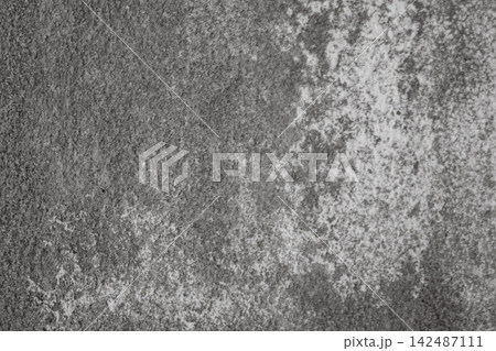 Grungy concrete wall with white efflorescence streaks and dark shadows, weathered, textured surface ideal as rugged and aged background Grungy concrete wall with white efflorescence streaks and dark shadows, weathered, textured surface ideal as rugged and aged background 142487111