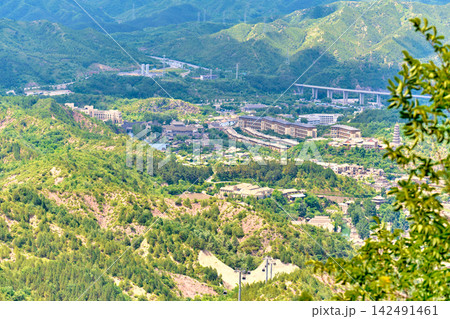 View of the water city of Gubei from the height of the Great Wall of China View of the water city of Gubei from the height of the Great Wall of China 142491461