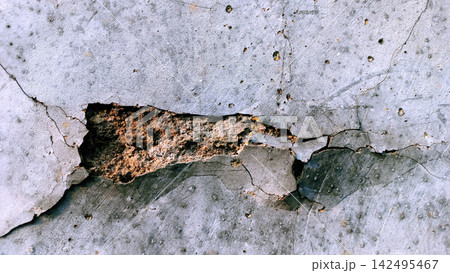 Damaged Concrete Wall with Deep Crack and Hole Damaged Concrete Wall with Deep Crack and Hole 142495467
